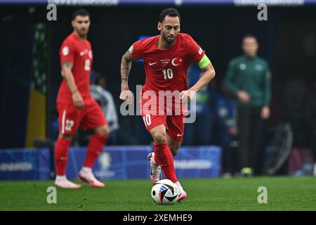 DORTMUND, GERMANY - JUNE 18: Hakan Calhanoglu of Turkiye controls the ball during the UEFA EURO 2024 group stage match between Turkiye and Georgia at Stock Photo