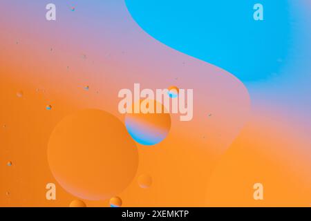 Colorful circles floating on a gradient background Stock Photo