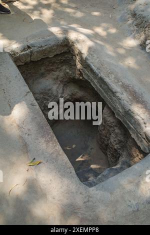 Ho Chi Minh City, Vietnam - 2 Feb, 2024: Vietnam war era vietcong booby-trap in Cu Chi, Vietnam Stock Photo