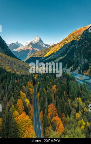 A river and highway road running through a desert canyon in Gateway ...