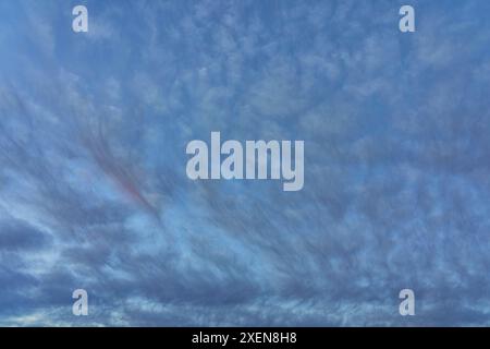 Abstract image of clouds in the sky during the late afternoon over Watson Lake in the Yukon; Yukon, Canada Stock Photo