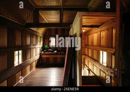 Interior of a traditional home called Tongkonan, in Sulawesi, Indonesia; Kesu, Tana Toraja Regency, Sulawesi, Indonesia Stock Photo