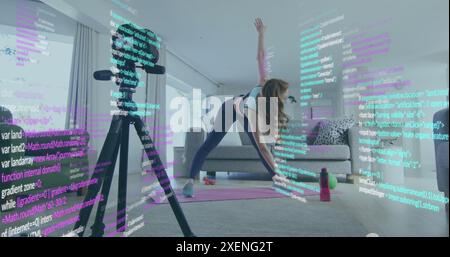 Image of computer language over caucasian woman recording stretching on image recorder at home Stock Photo