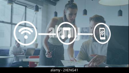 Image of icon in circles connected with lines, caucasian coworkers planning strategy in office Stock Photo