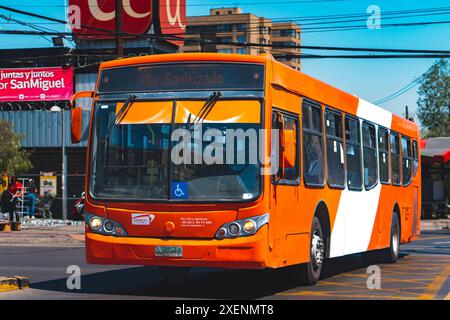 Santiago, Chile - October 19 2021: A public transport Transantiago, or Red Metropolitana de Movilidad, bus doing route 107 Stock Photo