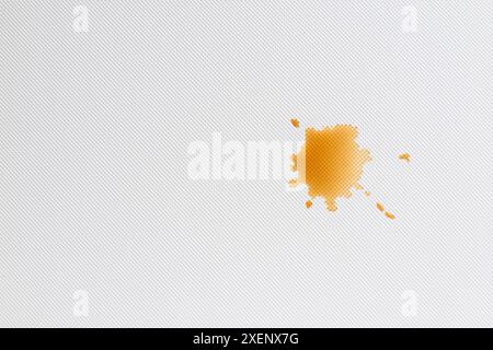 drop of coffee brown color on white dot surface modern stylish wallpaper background or backdrop close up detail and texture empty pattern. Stock Photo