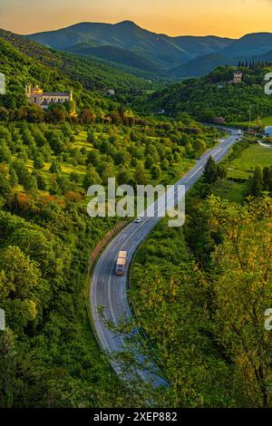 Aerial panorama of the Via Flaminia near Spoleto with the church of San Pietro extra moenia, Spoleto, Perugia province, Umbria, Italy, Europe Stock Photo