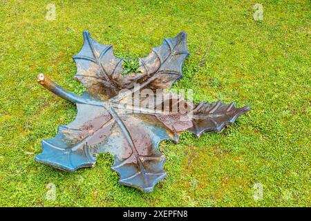 Cast iron casting of a tree leaf. Stock Photo