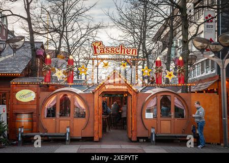 A stand at the Duisburg Christmas market is festively decorated, capturing the essence of the holiday season in Germany. The market is known for its v Stock Photo