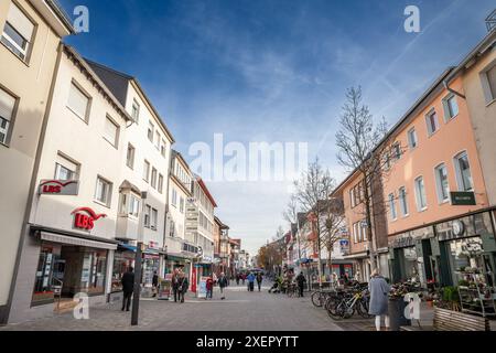 Picture of the main street of Troisdorf, Kolner strasse, with shops and stores while people are passing by. Troisdorf is a city in the Rhein-Sieg-Krei Stock Photo