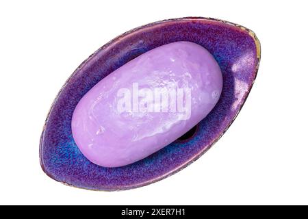 Top view of leaf shape purple ceramic soap bar, tray, dish, holder with fragrant purple soap isolated on white background with clipping path. Stock Photo