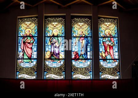 Stained glass window of Four Evangelists in a Catholic church in Tilaran, a small town in Costa Rica, Central America Stock Photo