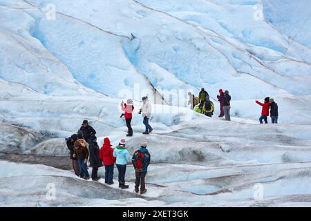 Mini trekking. Walk on the glacier with crampons. Perito Moreno glacier. Los Glaciares National Park. Near El Calafate. Santa Cruz province. Patagonia Stock Photo