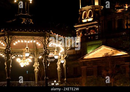 GUADALAJARA, JALISCO, MEXICO: A gazebo in the shadows of the Catedral Metropolitana de Guadalajara (Metropolitan Cathedral of Guadalajara). Stock Photo