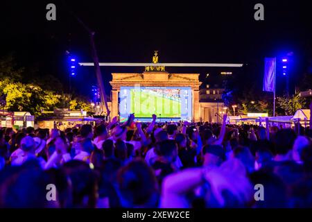 Berlin, Germany. 29th June, 2024. Soccer: European Championship, Germany - Denmark, final round, round of 16, public viewing Berlin. Fan zone at the Brandenburg Gate. Credit: Christoph Soeder/dpa/Alamy Live News Stock Photo