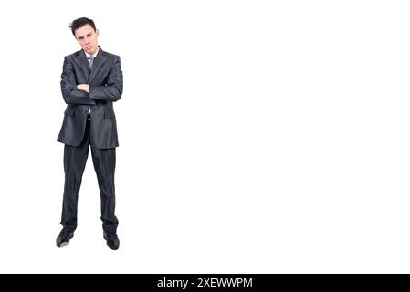 Bored elegant businessman with folded arms looking at camera Stock Photo