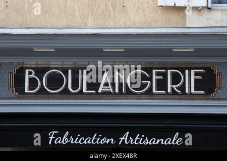 boulangerie fabrication artisanale sign vintage text french means artisanal bakery store front entrance Stock Photo