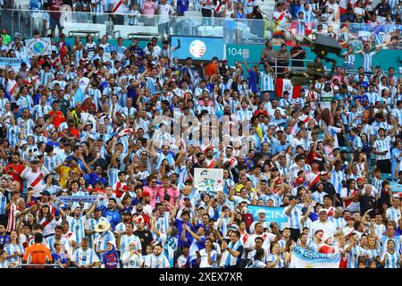 Miami Gardens, Florida, USA. 29th June, 2024. Argentina’s supporters cheer for their team during the Copa America USA 2024, group match between Argentina and Peru, at Hard Rock stadium in Miami, on June 29, 2024. Credit: Alejandro Pagni/Alamy Live News Stock Photo