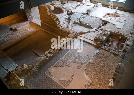 Roman mozaic in Domus dell'Ortaglia, Roman domus from I to IV AD in Museo di Santa Giulia (Santa Giulia City Museum) in monastic complex of San Salvat Stock Photo