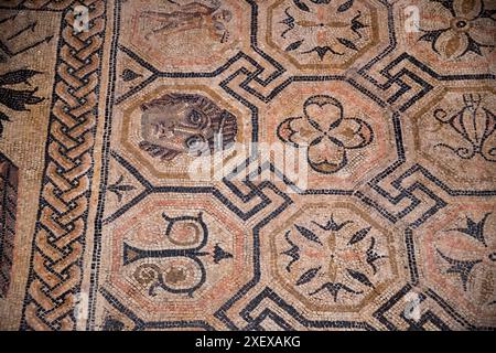 Roman mozaic in Domus dell'Ortaglia, Roman domus from I to IV AD in Museo di Santa Giulia (Santa Giulia City Museum) in monastic complex of San Salvat Stock Photo