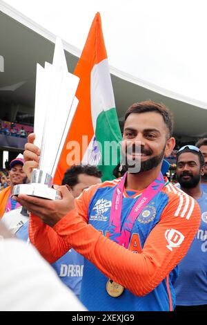 India's Virat Kohli celebrates victory following the 2024 ICC Men's T20 ...