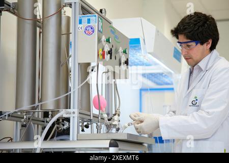 Researcher Distilling Dry distillation to produce dry solvents, synthesis lab, IkerChem ...