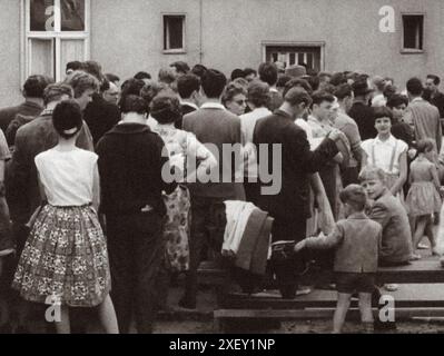 Serie of archivel photos depicts the August 1961 travel ban between East and West Berlin and shows the building of barricades that would eventually become the Berlin Wall. Germany. 1961 Stock Photo