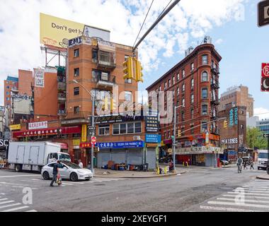 NYC Chinatown: 1 Eldridge Street is a brick mixed-use building, apartments over a two-story commercial podium. Stock Photo