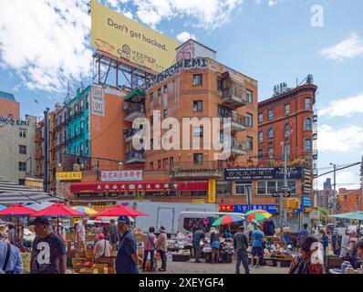 NYC Chinatown: 1 Eldridge Street is a brick mixed-use building, apartments over a two-story commercial podium. Stock Photo