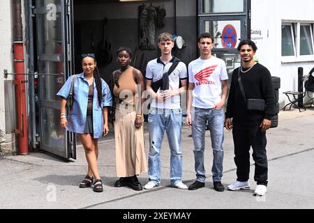 Munich, Germany. 30th June, 2024. Actors Virginia Obiakor (l-r), Vanessa Yeboah, Arton Malaj, Francesco Di Caro and Francis Ayozieuwa celebrate at the summer party of Stabil e.V X Actorsgarden during the Munich Film Festival. Credit: Felix Hörhager/dpa/Alamy Live News Stock Photo