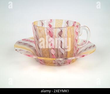 Antique 1900s Salviati Venetian filigrana a retortoli glass cup and saucer. Stock Photo