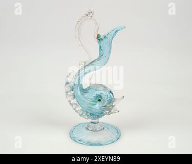 Antique 1900s Salviati Venetian blue glass and gold leaf dolphin glass ewer. Stock Photo