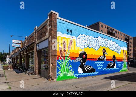 META project team of Brookita Corazon and Kid Quam painted the City of Lakes mural on September 25, 2022. The mural is located on the side of the Brya Stock Photo