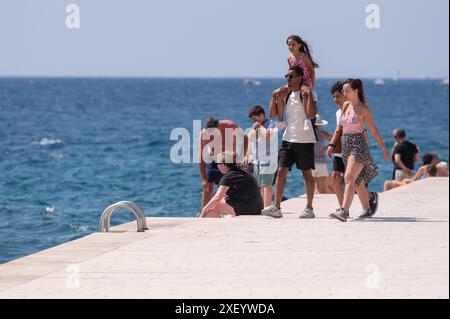 Zadar, Croatia. 30th June, 2024. People enjoy sunny day at Zadar ...