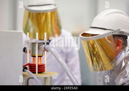 Vacuum Levitation Equipment  Assisted by an induction furnace, the vacuum levitation equipment 100-1000 g comprises a crucible, coil and mould manufac Stock Photo