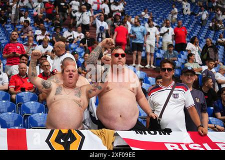 Gelsenkirchen, Germany. 30th June, 2024. England fans during the UEFA Euro 2024 match between England and Slovakia, Round of 16, played at Veltins-Arena stadium on June 30, 2024 in Gelsenkirchen, Germany. (Photo by Sergio Ruiz/PRESSINPHOTO) Credit: PRESSINPHOTO SPORTS AGENCY/Alamy Live News Stock Photo