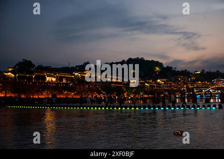View landscape toujiang river and cityscape Historical building heritage architecture of Xiangxi Phoenix Ancient City or Antique Old Town fenghuang fo Stock Photo