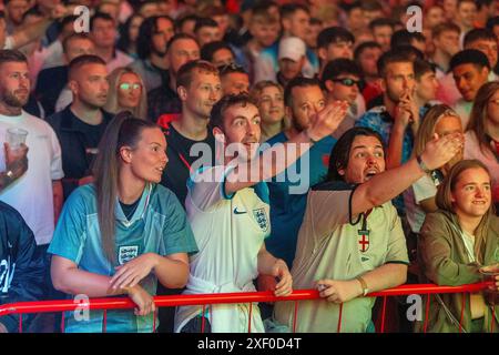 England fans at the Diecast, Manchester, during a screening of the UEFA Euro 2024, round of 16 match, between England and Slovakia. Picture date: Sunday June 30, 2024. Stock Photo