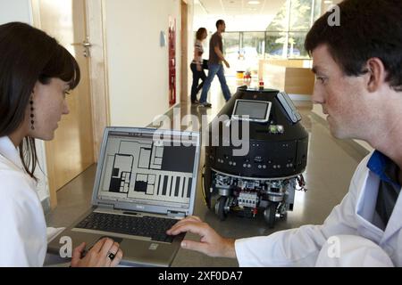 Researchers demonstrating a robot autonomous navigation capability using environment representation, Fatronik-Tecnalia, Research and Technology Center Stock Photo