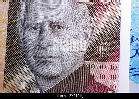 Close up detail of the first banknotes to feature King Charles III that was released in June 2024. Stock Photo