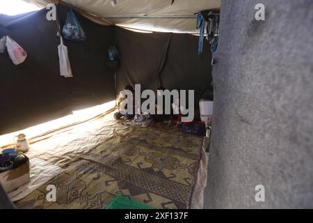 Noura Abu Al-Saud, a displaced Palestinian, lives in a tent inside a ...