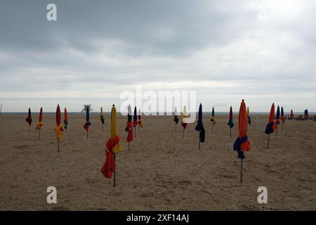 The famous parasols on the beach at Deauville Normandy France Stock Photo