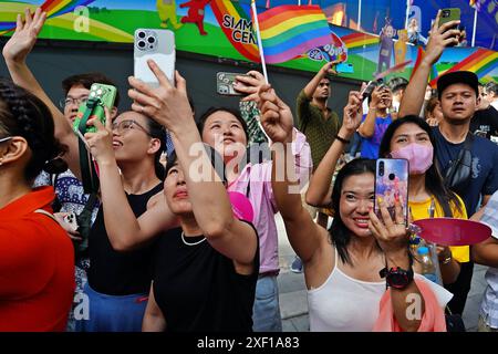 Bangkok, Thailand. 30th June, 2024. People take part in the Love Pride Parade 2024 event marking the beginning of marriage equality in Bangkok. The Thai government and private sectors hold the LOVE PRIDE PARADE 2024 event in Bangkok on Sunday to help make Thailand become a global pride destination. (Photo by Seksan Rochanametakul/SOPA Images/Sipa USA) Credit: Sipa USA/Alamy Live News Stock Photo