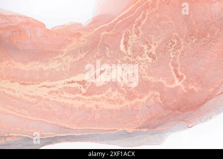 A close-up image of abstract art featuring swirls of peach and lavender paint, creating a mesmerizing texture Stock Photo