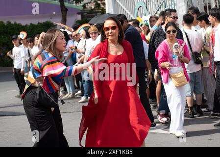 Bangkok, Thailand. 30th June, 2024. Supalak Amphuch(C) the Chairman of the Executive Board of The Mall Group take part event in attend Love Pride Parade 2024 an end Pride Month, Parade at the National Stadium, on June 30, 2024 in Bangkok. (Photo by Teera Noisakran/Pacific Press) Credit: Pacific Press Media Production Corp./Alamy Live News Stock Photo