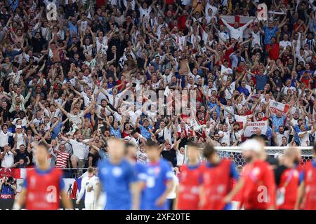 Gelsenkirchen. 30th June, 2024. Fans of England celebrate after the UEFA Euro 2024 round of 16 match between England and Slovakia in Gelsenkirchen, Germany on June 30, 2024. Credit: Bai Xuefei/Xinhua/Alamy Live News Stock Photo