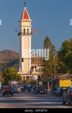 Zakynthos, Greece - August 14, 2016: Coastal street of Zante port, vertical photo with cars and people on the street Stock Photo