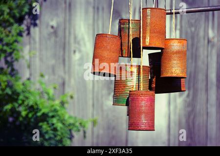 Scarecrow made of old rusted tin cans Stock Photo