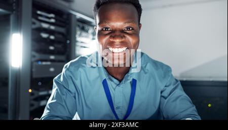 Man, happy and portrait or working in server room, system update and firmware installation or program developer. Online, network and cybersecurity or Stock Photo