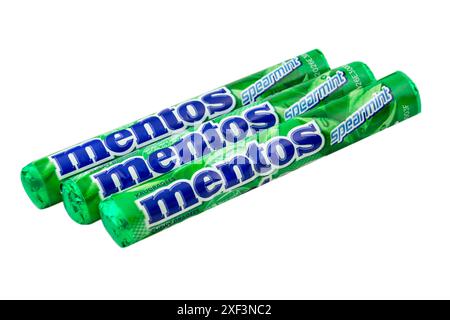 Hamburg, Germany -  June 29 2024:  3 Mentos Spearmint Chewy Dragees isolated on white background Stock Photo
